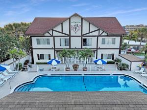 a view of the inn from the pool at Palm Crest Resort Motel in St Pete Beach