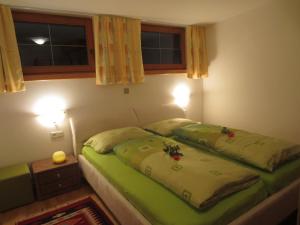 Postel nebo postele na pokoji v ubytování Apartments Penz