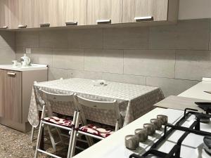 A kitchen or kitchenette at Palazzo Senesi