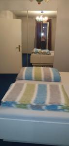 Posteľ alebo postele v izbe v ubytovaní Wohnung in Zentrumsnähe beim Hauptbahnhof (100 m2)