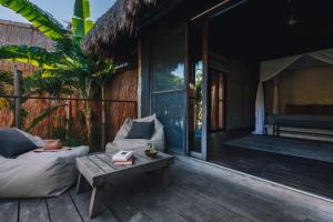 Posezení v ubytování Radhoo Tulum