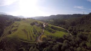 an aerial view of a park on a hill at Cerezal 1, casa en plena naturaleza 