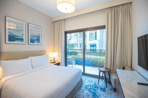 Postel nebo postele na pokoji v ubytování Luxurious 3 bedroom apartment with beach and pool access