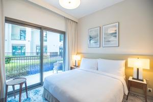 Postel nebo postele na pokoji v ubytování Luxurious 3 bedroom apartment with beach and pool access