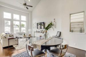 a white living room with a table and chairs at Gorgeous 4 Bed Home on St Mary's - Minutes to Riverwalk/Pearl in San Antonio