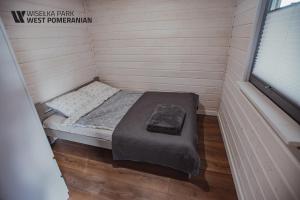 Posteľ alebo postele v izbe v ubytovaní Wisełka Park - West Pomeranian