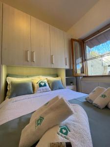 Un pat sau paturi într-o cameră la Ma. De House Lago del Turano