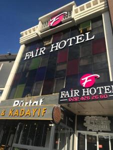 a building with a star hotel sign on it at Istanbul Fair Hotel in Istanbul