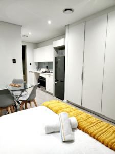 Dapur atau dapur kecil di Sugar Shores - Studio Apartment