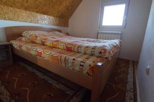 Postel nebo postele na pokoji v ubytování Guest House Happy