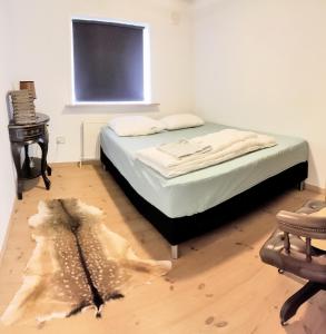 Ένα ή περισσότερα κρεβάτια σε δωμάτιο στο Villa Wunder