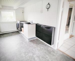Kuchyň nebo kuchyňský kout v ubytování Villa Wunder