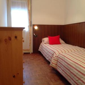 Postel nebo postele na pokoji v ubytování Casa ai Dossi