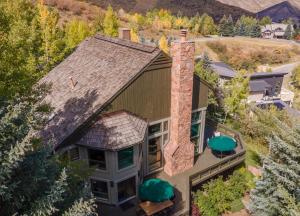 an aerial view of a house with a chimney at Modern Beaver Creek Private House! in Avon