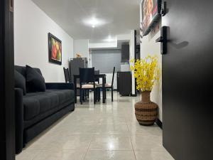 Un lugar para sentarse en Apartahotel parque del café-3km