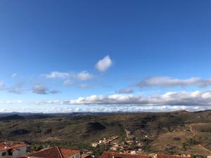 a view of a city from a mountain at Apto inteiro de luxo em Diamantina in Diamantina