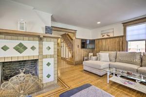 a living room with a couch and a fireplace at Idyllic Atlantic City Home - 1 Block to Beach in Atlantic City