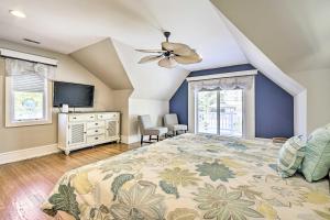 a bedroom with a large bed and a ceiling fan at Idyllic Atlantic City Home - 1 Block to Beach in Atlantic City