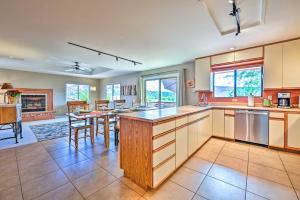 a large kitchen with a large island in the middle at Scenic Sedona Duplex - Cathedral Rock Views! in Sedona