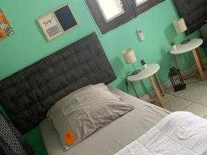 En eller flere senge i et værelse på Le calme du Vauclin + 32 billeder