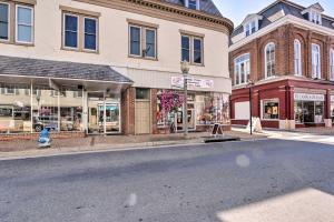 an empty street in a city with buildings at Charming Front Royal Retreat about 1 Mi to River! in Front Royal