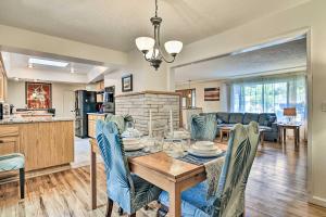 a kitchen and living room with a table and chairs at Charming Hillsboro Home with Yard, Dogs Welcome in Hillsboro