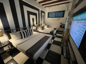TV a/nebo společenská místnost v ubytování Italy Condotel Darasa