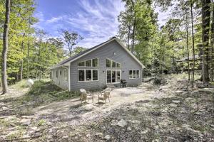 a small house in the middle of a forest at Door County Family Home 3 Mi Whitefish Dunes in Sturgeon Bay