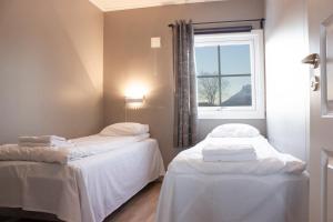 Postel nebo postele na pokoji v ubytování Topcamp Havblikk - Helgeland