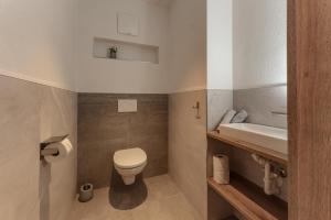 Łazienka w obiekcie Appartements Die Ramsauerin