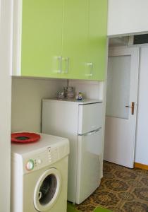 Kuchyň nebo kuchyňský kout v ubytování Apartment Mila