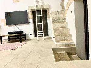 Μια τηλεόραση ή/και κέντρο ψυχαγωγίας στο Lu Chiapparu - Vacanza Low Cost