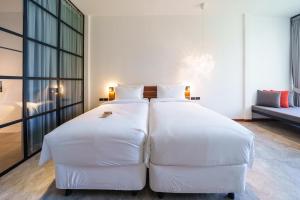Letto o letti in una camera di Baan Ploy Sea