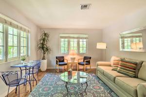 a living room with a couch and a table and chairs at Vibrant West Palm Beach Home Less Than 2 Mi to Beach! in West Palm Beach