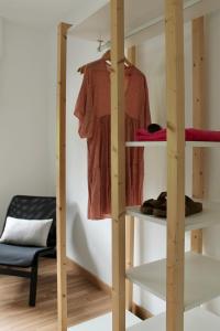 a room with wooden shelving and a closet at Altos de Baiona in Baiona