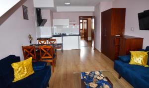 Posedenie v ubytovaní APARTAMENTY TR 11 Apartament nr 6