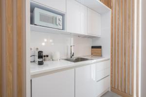 A kitchen or kitchenette at Pale Orb Properties (1) Még 13 kép