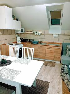Kuchyň nebo kuchyňský kout v ubytování Apartmán Romanna