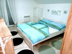 Postel nebo postele na pokoji v ubytování Apartmán Romanna
