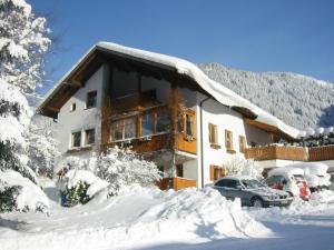 Appartementhaus Vermala v zime