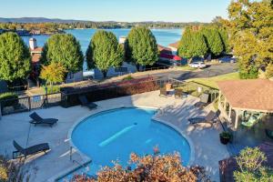an overhead view of a pool with a view of the water at Lakefront Hot Springs Condo with Pool Access! in Hot Springs