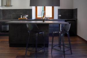 A kitchen or kitchenette at Piccola Venezia Canal View Charming Flat