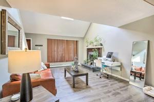 a living room with a couch and a table at Waterbury Home Playground and Porch Swing in Waterbury