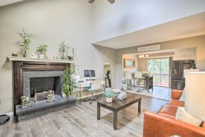 a living room with a fireplace and a couch at Waterbury Home Playground and Porch Swing in Waterbury