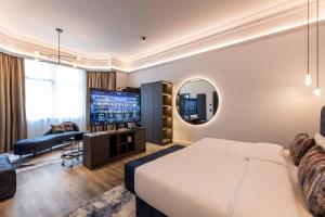 Postel nebo postele na pokoji v ubytování O11 Boutique Hotel Vienna