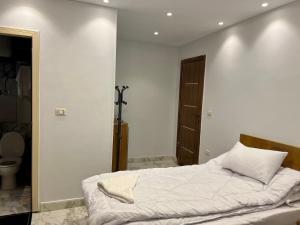 Postel nebo postele na pokoji v ubytování Life Pyramids Inn
