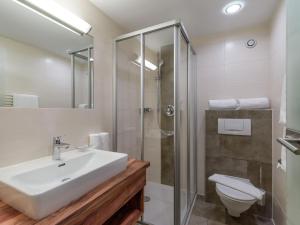 Ванная комната в Hotel Kössler