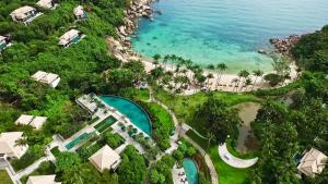 an aerial view of a resort and the ocean at Banyan Tree Samui in Lamai