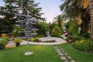 A garden outside TRYP by Wyndham Corfu Dassia