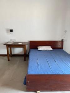 Postel nebo postele na pokoji v ubytování Sea Sands Beach Hostel
